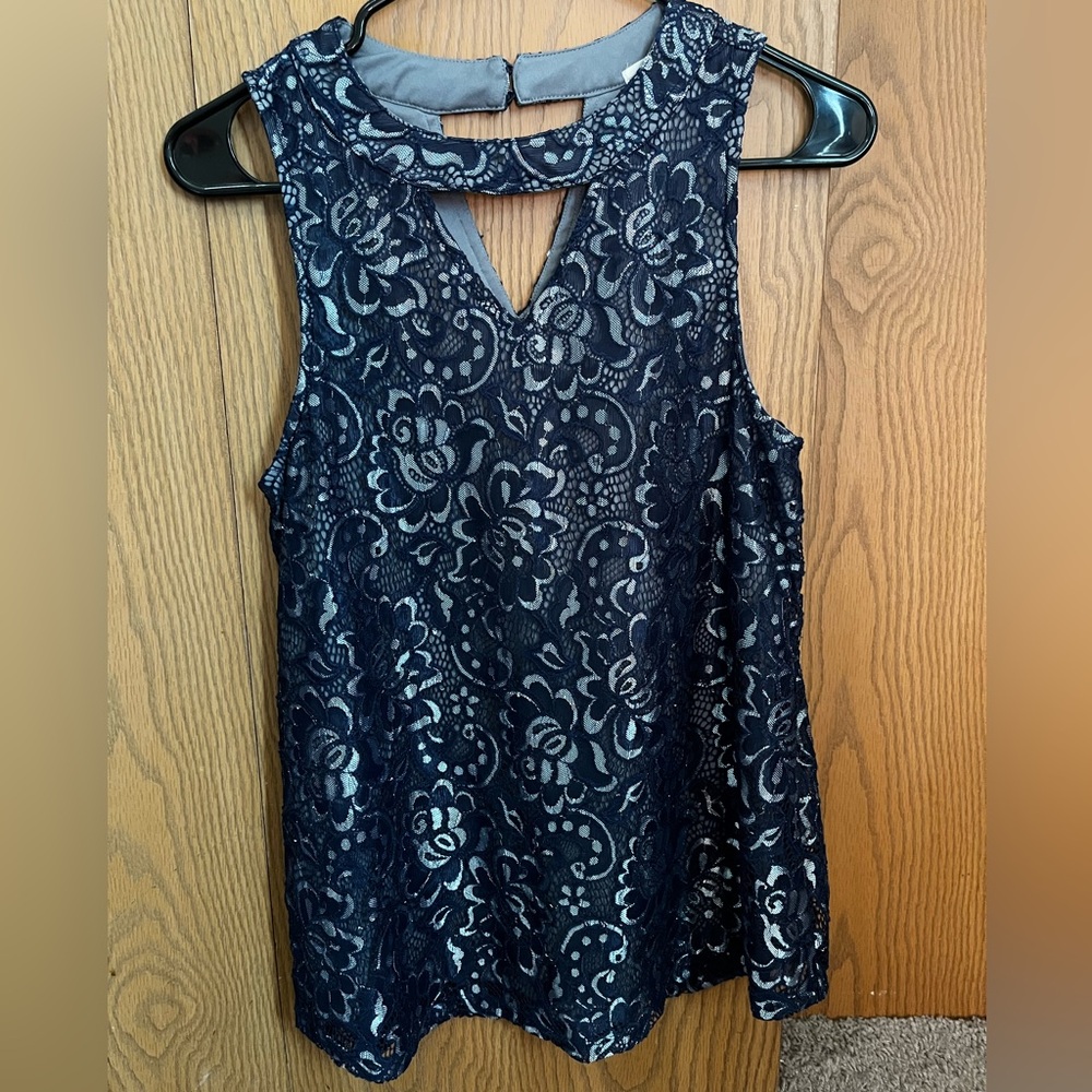 Blue with lace detailing tank top. Size small from Maurice’s.
